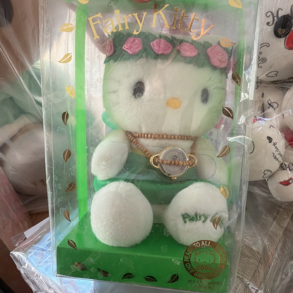 Hello Kitty White Plush with Green Accents and Pink Flower Crown